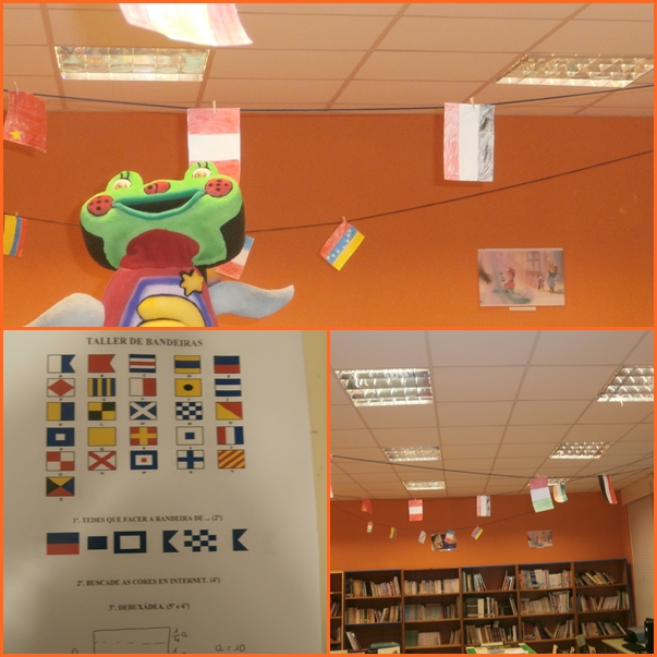Mascota da biblioteca escolar na asla de lectura rodeada de bandeiras feitas polos nenos e nenas do colexio
