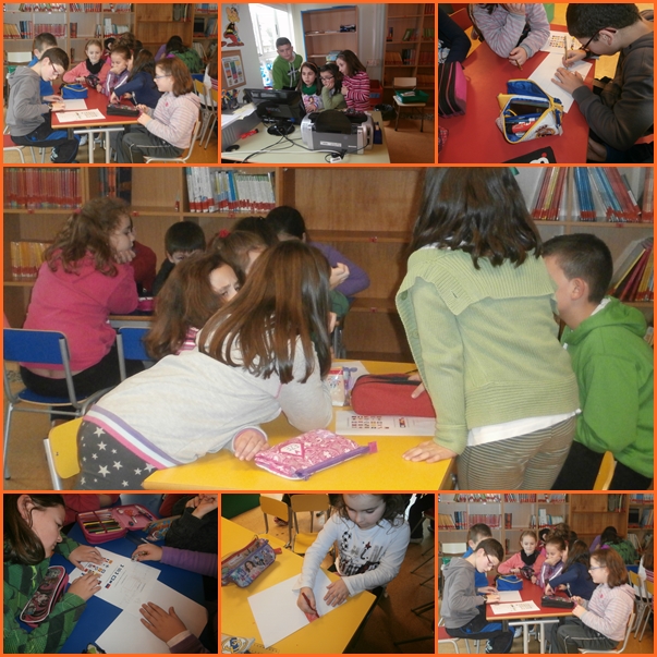 Nenos e nenas traballando na biblioteca nun taller de bandeiras