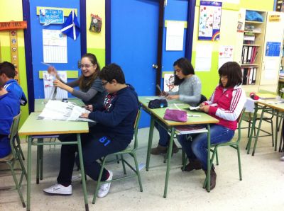 The sixth graders are making their Halloween masks
