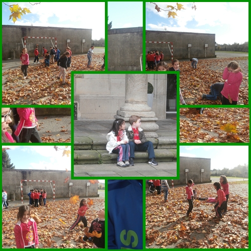 Nenos e nenas da Serra de Outes xogando no patio coas follas